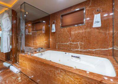 Rena-145-nqea-luxury-charter-yacht-master-stateroom-bath-3